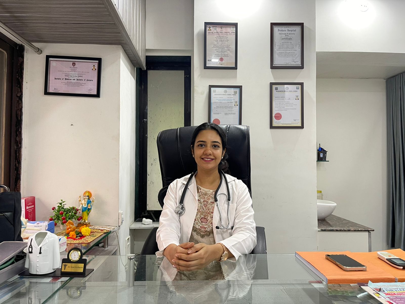 Dr. Sejal Kulkarni at her Thane clinic in white coat