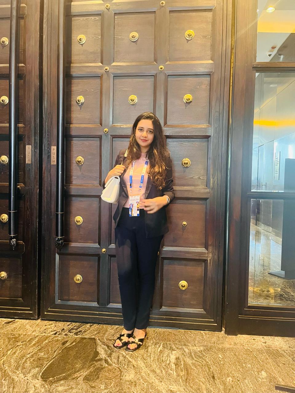 Dr. Sejal Kulkarni at IAGE conference, wearing conference badge